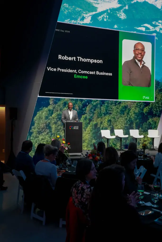 Robert Thompson speaking at the Comcast RISE Day celebration in Colorado Springs, Colorado.