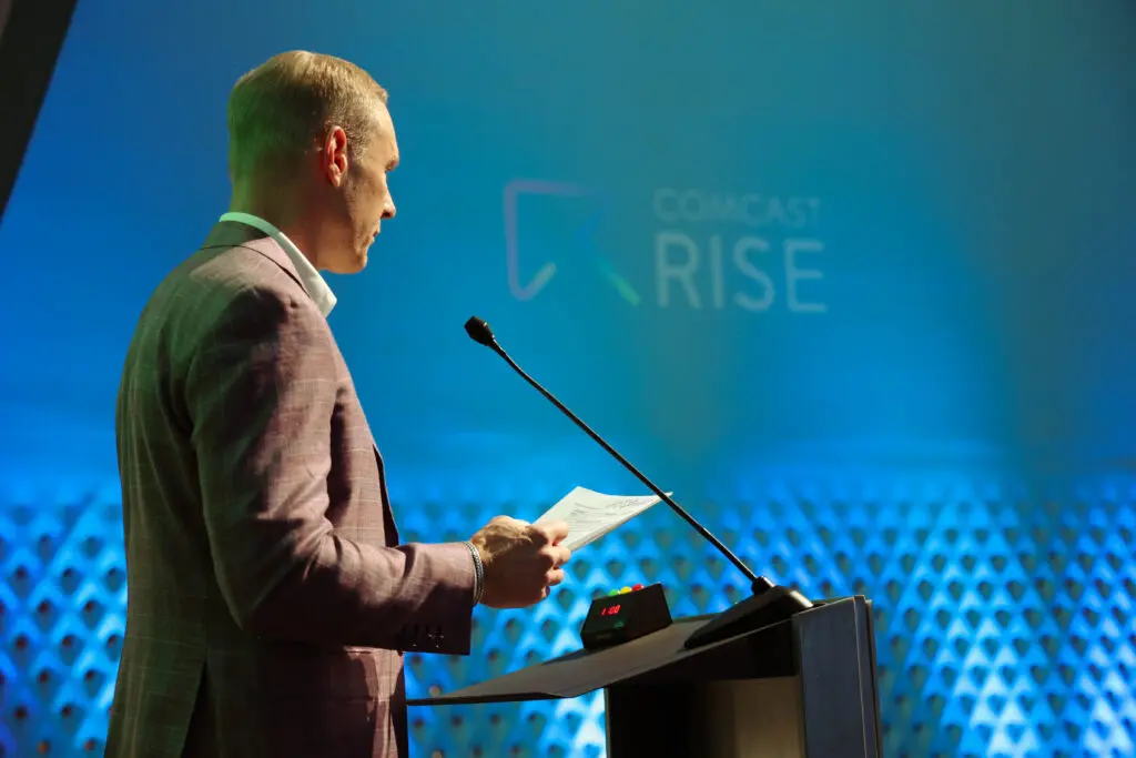 J.D. Keller speaking at the Comcast RISE Day celebration in Colorado Springs, Colorado.