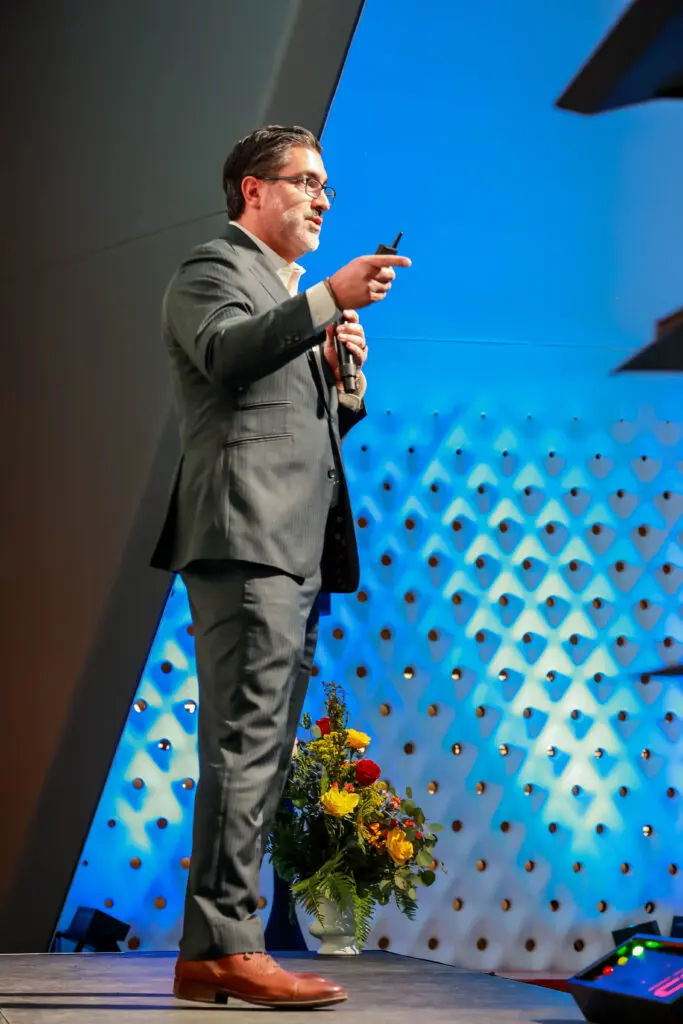 Jonathan Liebert speaking at the Comcast RISE Day celebration in Colorado Springs, Colorado.