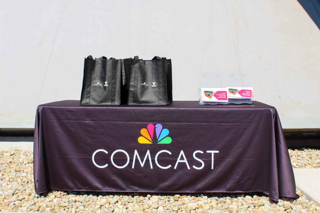 Comcast booth at the Boys & Girls Clubs of Weld County's Teen Center grand opening event.