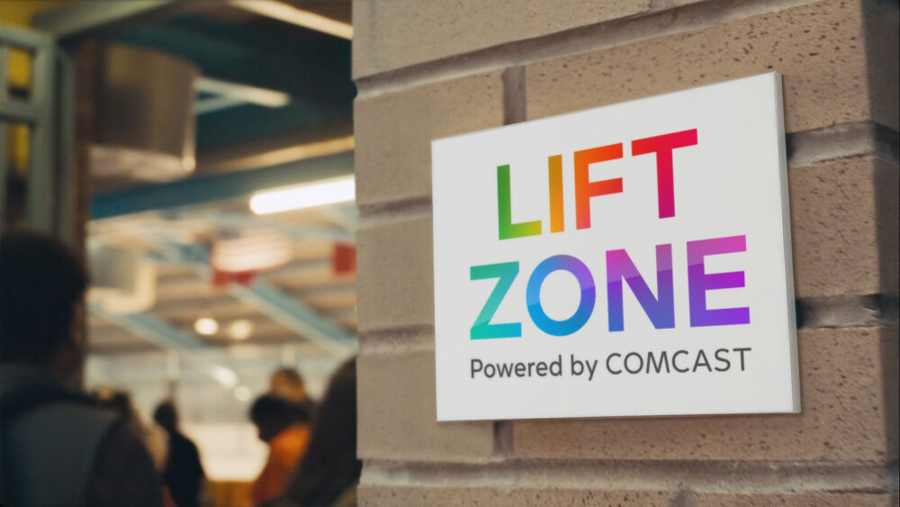 Lift Zone by Comcast logo on a wall.