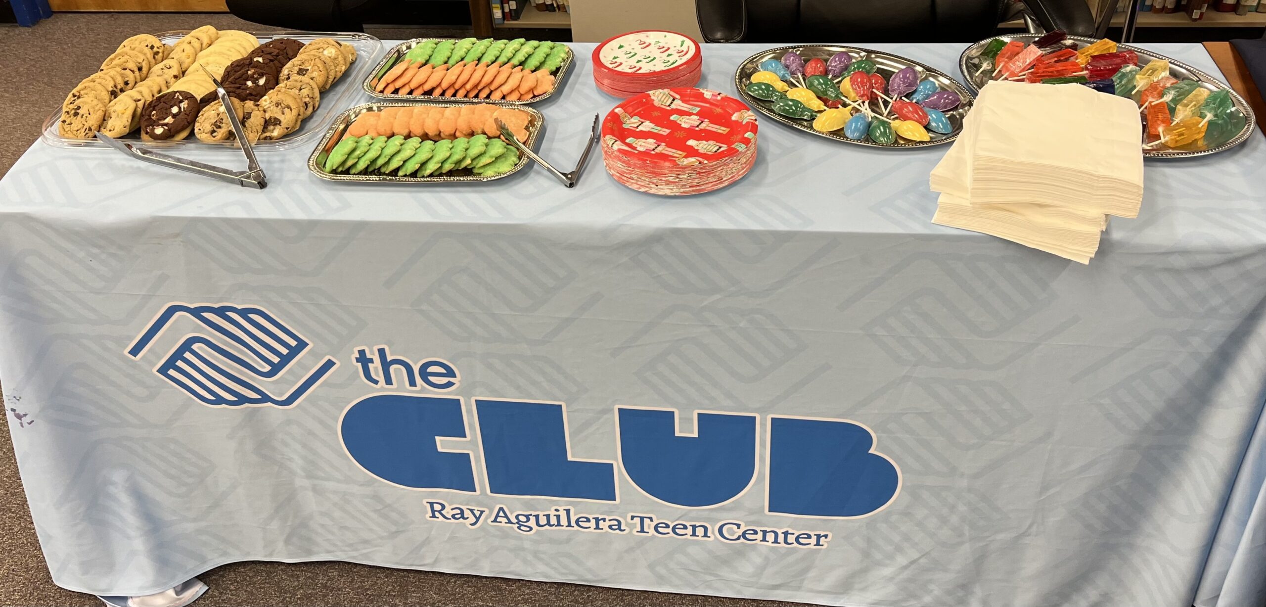 Cookies and treats on a table at the Boys & Girls Clubs of Pueblo County holiday event.